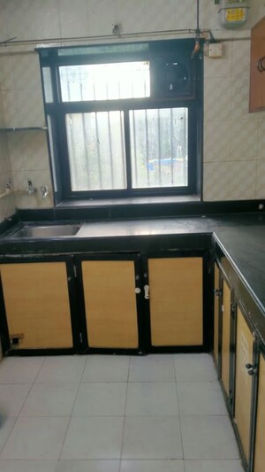 Kitchen in 1 BHK Apartment at Gokul Vihar Apartment, Kandivali East – for Sale