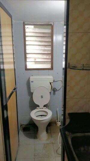 Bathroom in 1 BHK Apartment at Gokul Vihar Apartment, Kandivali East – for Sale