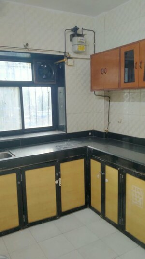 Kitchen in 1 BHK Apartment at Gokul Vihar Apartment, Kandivali East – for Sale