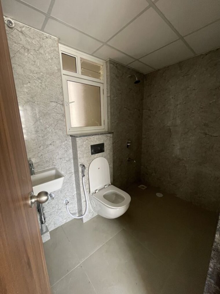 Bathroom, kolte-patil-life-republic-arezo 2 Bedroom 649 Sq.Ft. Apartment In Hinjewadi Pune 10701875