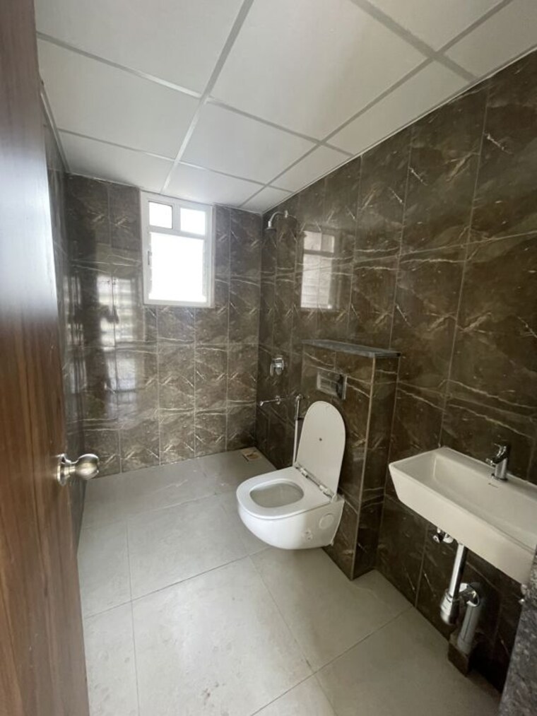 Bathroom, kolte-patil-life-republic-arezo 2 Bedroom 649 Sq.Ft. Apartment In Hinjewadi Pune 10701875