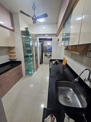 Kitchen in 2 BHK Apartment at Shree Satya Shankar Residency, Manpada – for Rent