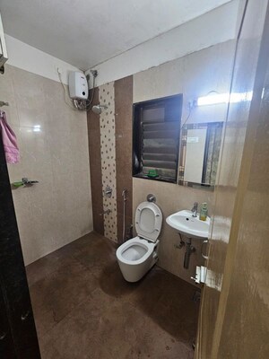 Bathroom in 2 BHK Apartment at Shree Satya Shankar Residency, Manpada – for Rent