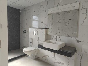 Bathroom in 4 BHK Builder Floor at Sector 21 – for Rent