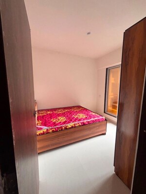Bedroom in 1 BHK Apartment at Gurukrupa PG Vatika, Badlapur East – for Sale