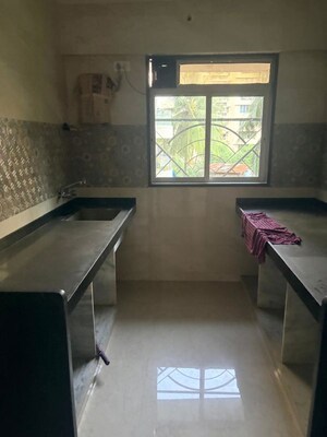 Kitchen in 2 BHK Apartment at Aakar Goregaon Rasik CHS, Goregaon West – for Rent
