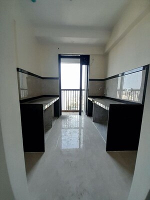 Kitchen in 3 BHK Apartment at Dhamji Shamji Mahavir Spring Tulip Phase 1, Pokhran Road No Two – for Rent