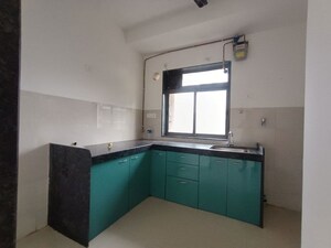 Kitchen in 1 BHK Apartment at Runwal Eirene, Balkum Pada – for Rent