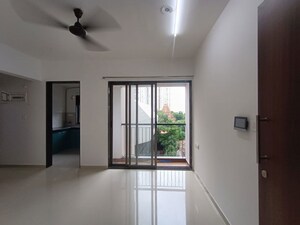 Living Room in 1 BHK Apartment at Runwal Eirene, Balkum Pada – for Rent