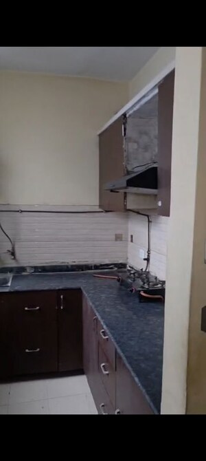 Kitchen in 2 BHK Apartment at Grah Avas Green View Heights, Raj Nagar Extension – for Rent