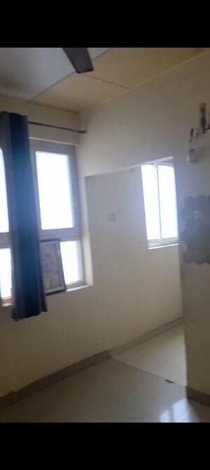 Room in 2 BHK Apartment at Grah Avas Green View Heights, Raj Nagar Extension – for Rent