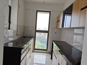 Kitchen in 3 BHK Apartment at Dhamji Shamji Mahavir Spring Tulip Phase 1, Pokhran Road No Two – for Rent