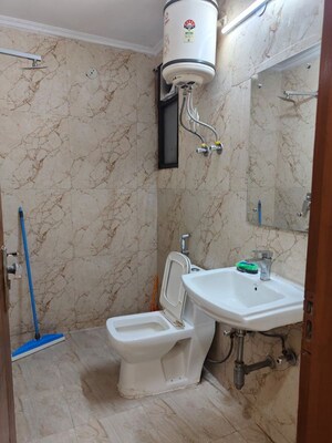 Bathroom in 3 BHK Apartment at Freedom Fighters Enclave – for Rent