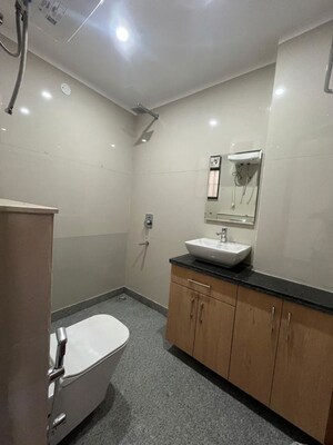 Bathroom in 3 BHK Apartment at Freedom Fighters Enclave – for Rent
