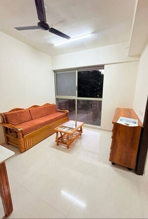 Living Room in 1 BHK Apartment at Lodha Crown Quality Homes, Majiwada – for Rent