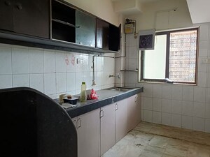 Kitchen in 2 BHK Apartment at Vasundhara CHS Gokuldham, Gokuldham Colony – for Rent
