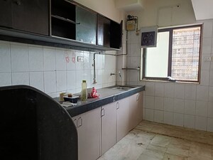 Kitchen in 2 BHK Apartment at Vasundhara CHS Gokuldham, Gokuldham Colony – for Rent