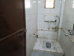 Bathroom in 2 BHK Apartment at Vasundhara CHS Gokuldham, Gokuldham Colony – for Rent