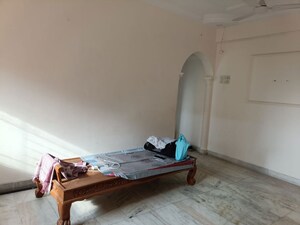 Bedroom in 2 BHK Apartment at Vasundhara CHS Gokuldham, Gokuldham Colony – for Rent