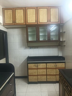 Kitchen in 3 BHK Apartment at Riddhi Tower, Malad East – for Rent