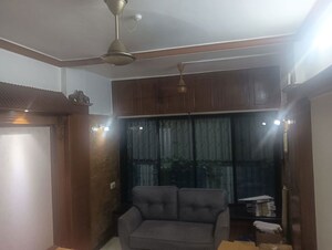 Living Room in 3 BHK Apartment at Riddhi Tower, Malad East – for Rent