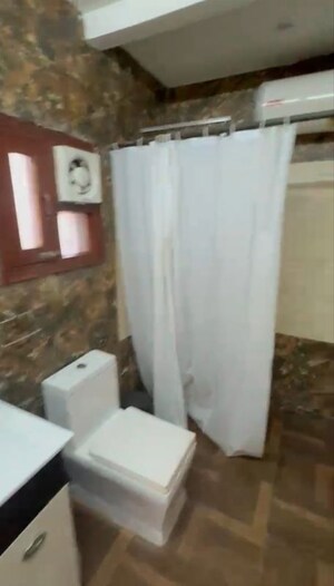 Bathroom in 2 BHK Apartment at Greater Kailash – for Rent