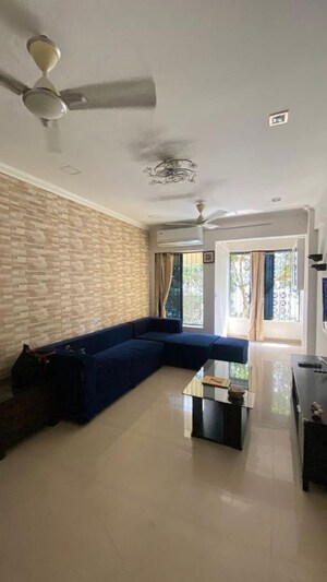 Living Room in 1.5 BHK Apartment at Bandra West – for Rent