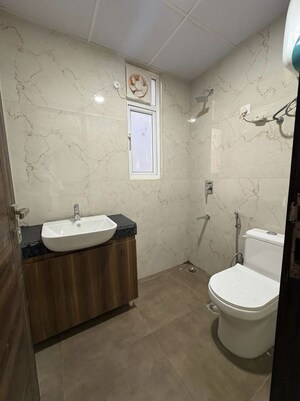 Bathroom in 3 BHK Builder Floor at M3M Soulitude, Sector 89 – for Sale