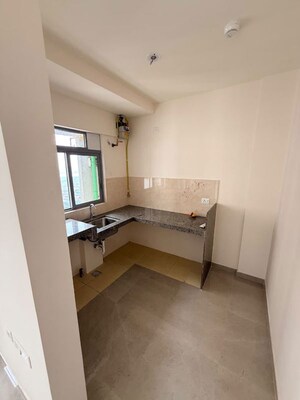 Kitchen in 2 BHK Apartment at Piramal Vaikunth, Balkum Pada – for Rent