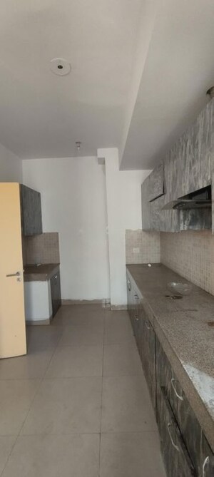 Kitchen in 4 BHK Apartment at Emaar Gurgaon Greens, Sector 102 – for Rent
