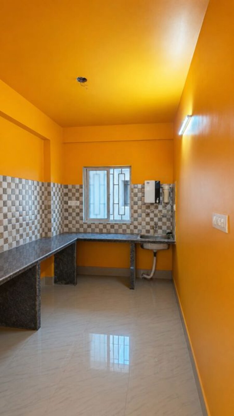 Kitchen, new town action area ii 3 Bedroom 1100 Sq.Ft. Apartment In New Town Action Area ii Kolkata 10702370