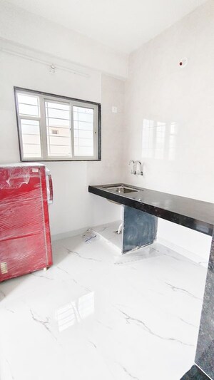 Kitchen in 1 BHK Apartment at Wadgaon Sheri – for Rent