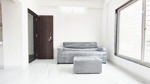 Living Room in 1 BHK Apartment at Wadgaon Sheri – for Rent