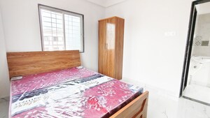 Bedroom in 1 BHK Apartment at Wadgaon Sheri – for Rent