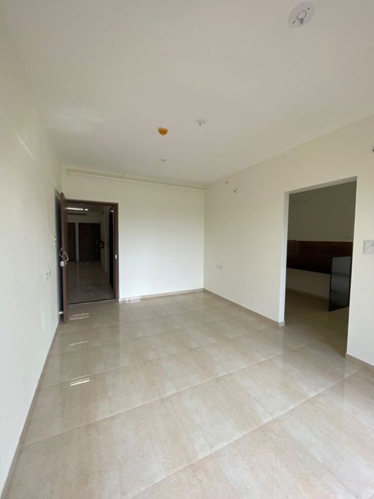 Living Room, kolte-patil-life-republic-16th-avenue-arezo 2 Bedroom 628 Sq.Ft. Apartment In Hinjewadi Pune 10702380