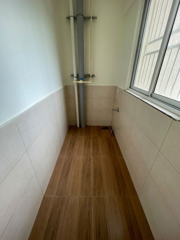 Laundry Area, kolte-patil-life-republic-16th-avenue-arezo 2 Bedroom 628 Sq.Ft. Apartment In Hinjewadi Pune 10702380