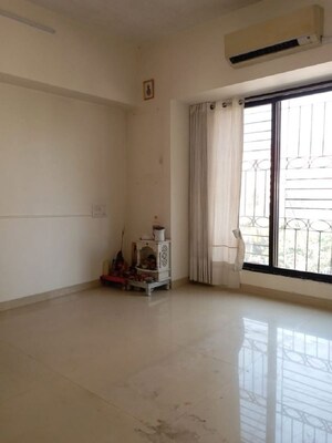 Room in 2 BHK Apartment at Bandra West – for Rent