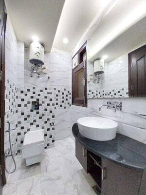Bathroom in 4 BHK Builder Floor at Sector 31 – for Rent