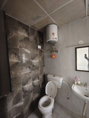 Bathroom in 2 BHK Apartment at Pivotal Riddhi Siddhi, Sector 99 – for Rent