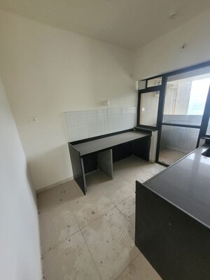 Kitchen in 3 BHK Apartment at Shapoorji Pallonji Vanaha Golfland, Bavdhan – for Rent