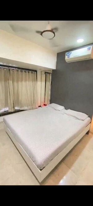 Bedroom in 2 BHK Apartment at Zee Swastik, Vile Parle East – for Rent
