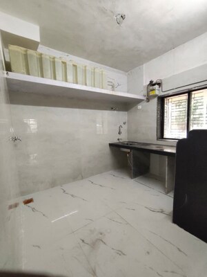 Kitchen in 2 BHK Apartment at Silver Sarita, Mira Road – for Sale