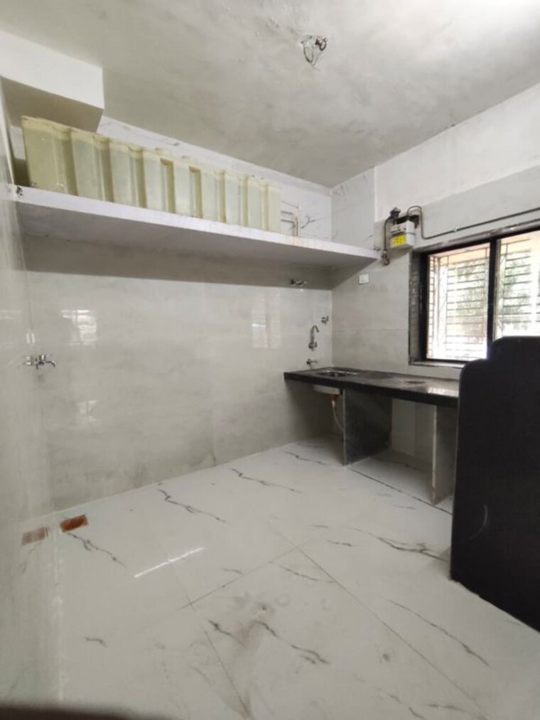 Kitchen, silver-sarita 2 Bedroom 980 Sq.Ft. Apartment In Mira Road Thane 10702521