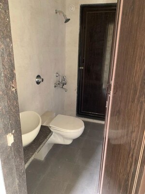 Bathroom in 1 BHK Apartment at Puranik Hometown, Ghodbunder Road – for Rent
