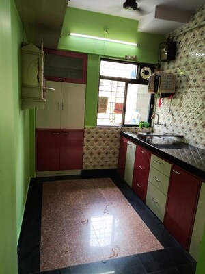 Kitchen in 1 BHK Apartment at Kanchan Pushp Society, Ghodbunder Road – for Rent