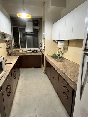 Kitchen in 3 BHK Apartment at DLF The Wellington Estate, Dlf Phase V – for Rent