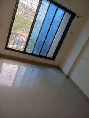 Bedroom in 2 BHK Apartment at Rohit Towers, Malad West – for Sale