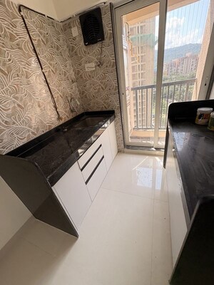 Kitchen in 1 BHK Apartment at Raunak Residency Thane, Pokhran Road No One – for Rent
