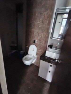 Bathroom in 2 BHK Apartment at Raj Infinia, Malad West – for Rent