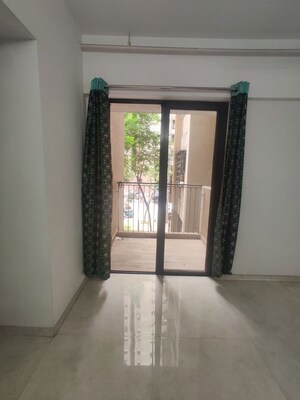 Living Room in 1 BHK Apartment at Lodha Palava City Lakeshore Greens, Dombivli East – for Rent